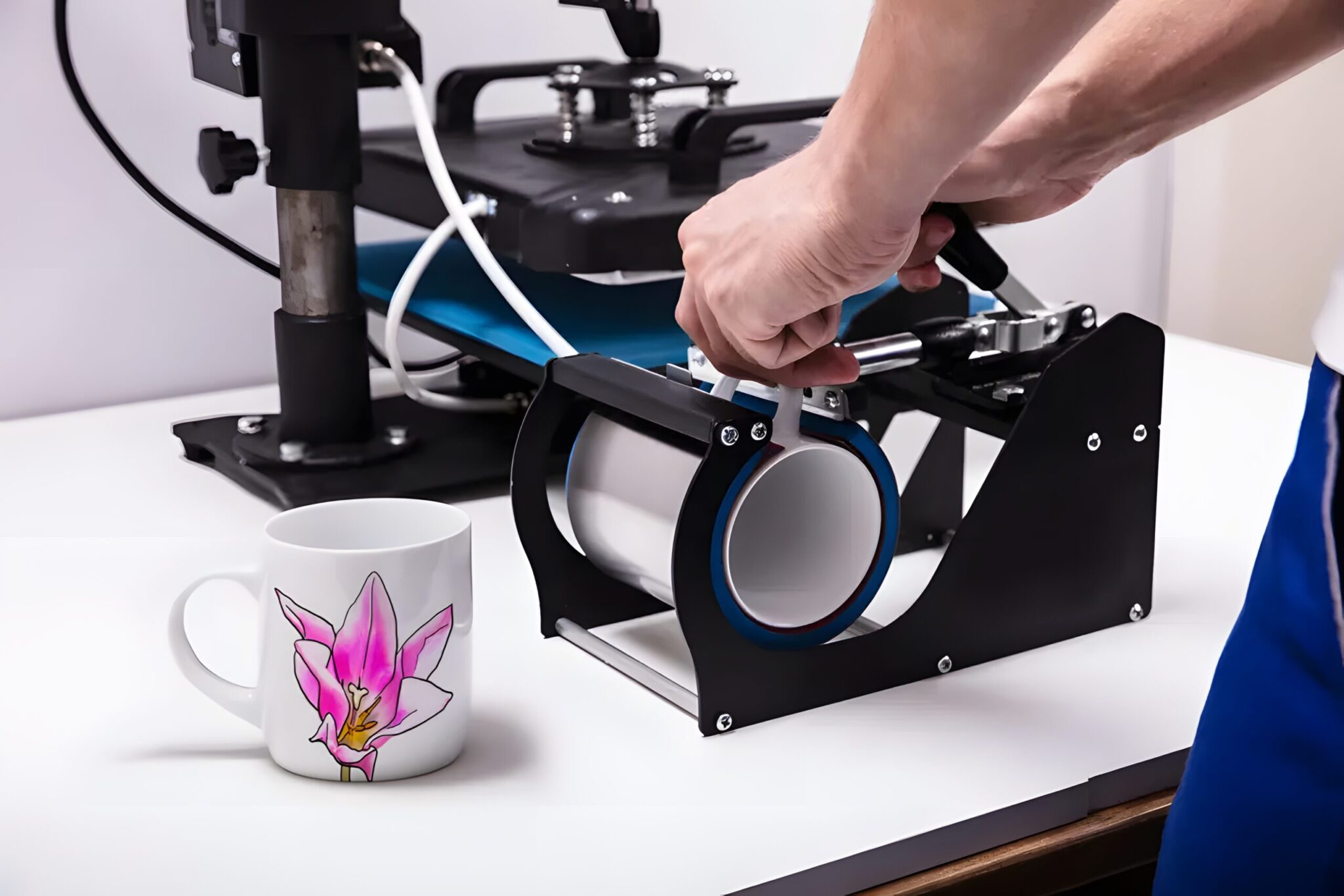 Sublimation printer being used to print on mugs for Dye-Sublimation Printing!