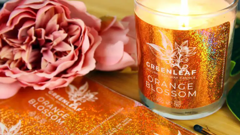 Lovely shiny orange blossom sticker on product